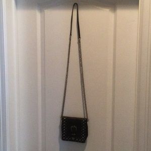 Black purse with buckle design!